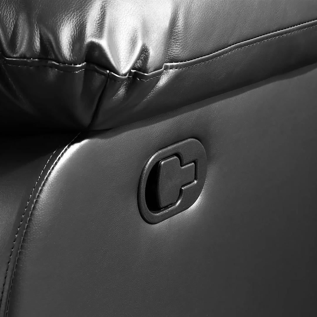 "Recliner button at side of sofa for manual  reclining mechanism"