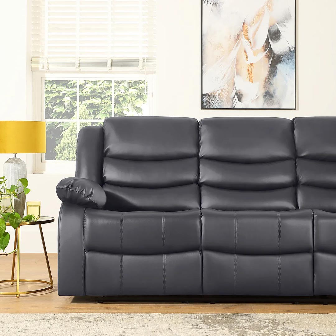 "Manual recliner sofa set with soft-touch leather and breathable comfort"