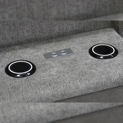 "Wireless charging pad integrated into the armrest of the Montana recliner, offering tech convenience in a stylish sofa design."