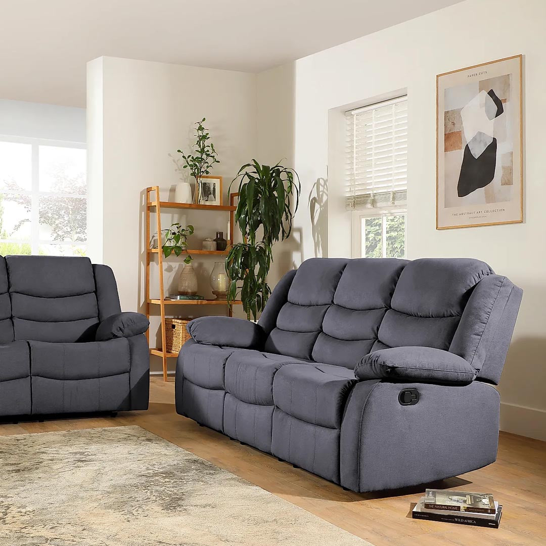 "Grey Pisa 3+ 2-seater recliner sofa with footrest, high back, manual reclining, and comfy, plush fabric for a cozy and inviting space."