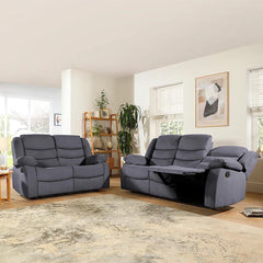 "Grey Pisa 3+2 recliner sofa suite with soft fabric upholstery and manual recline, perfect for family living spaces."