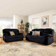 ​"Modern black fabric reclining sofa enhancing minimalist interior design"