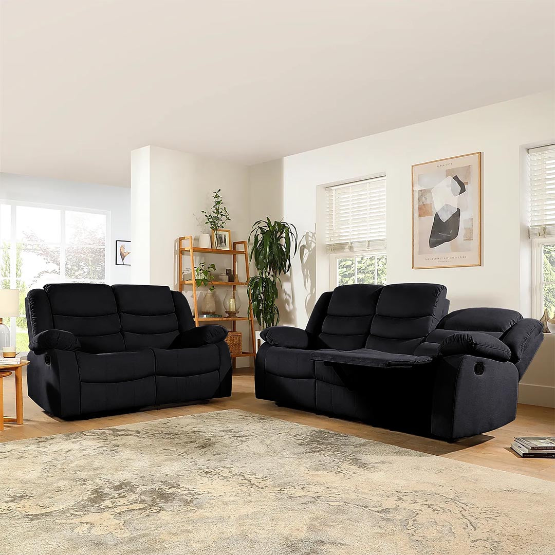 "​ComfyChoices black recliner sofa with manual reclining mechanism"