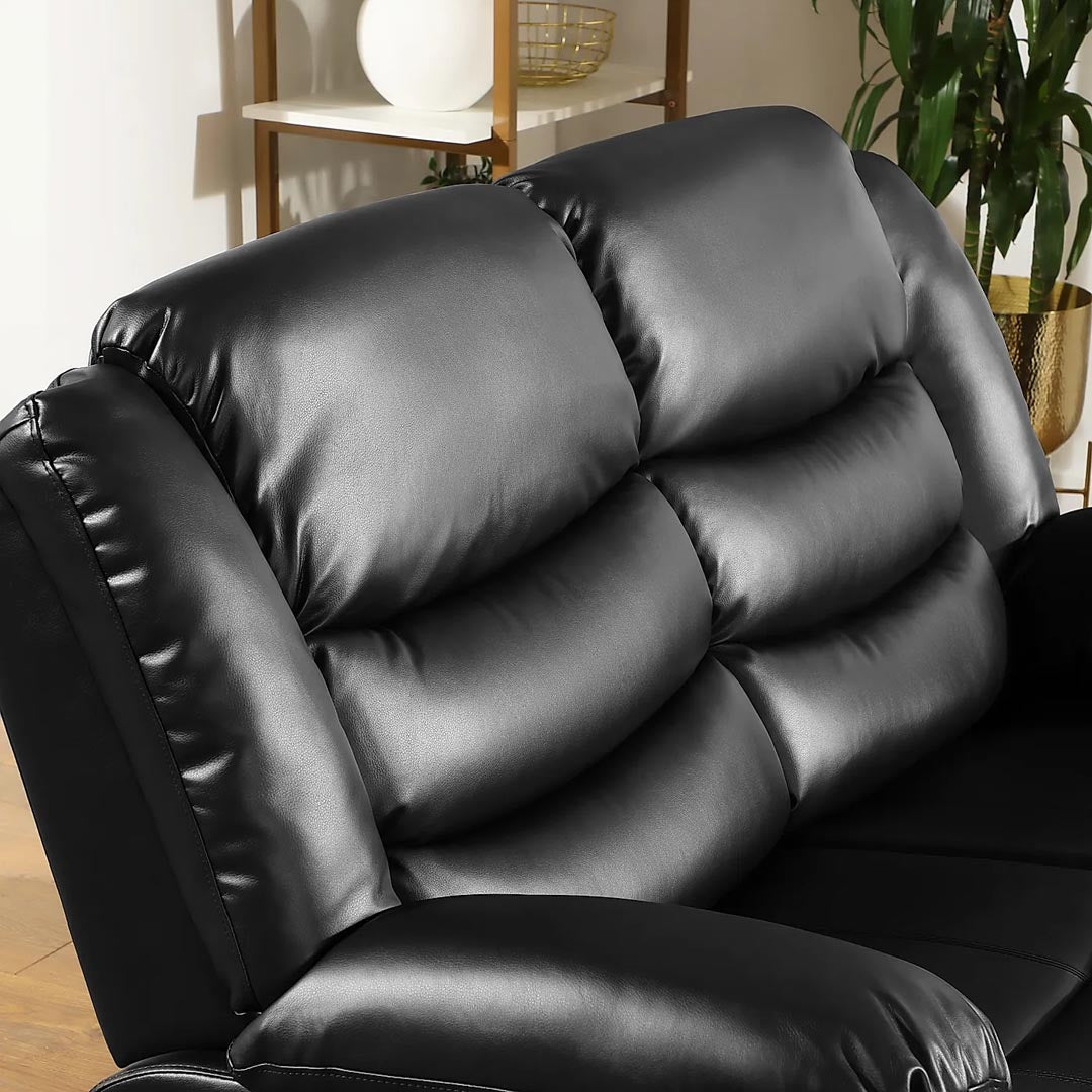 "Compact leather recliner sofa in black with ergonomic support"