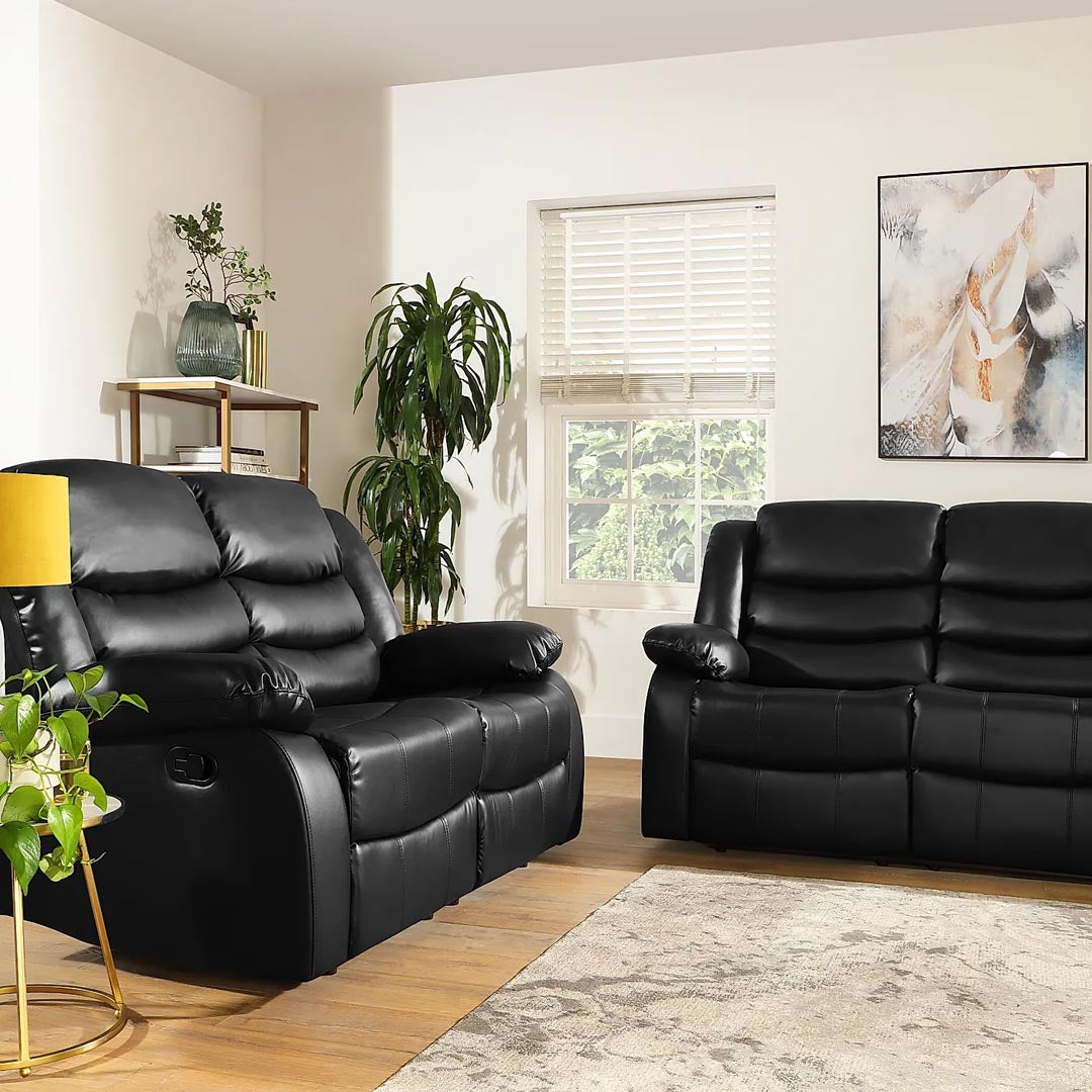 "Comfortable black leather recliner sofa for two."