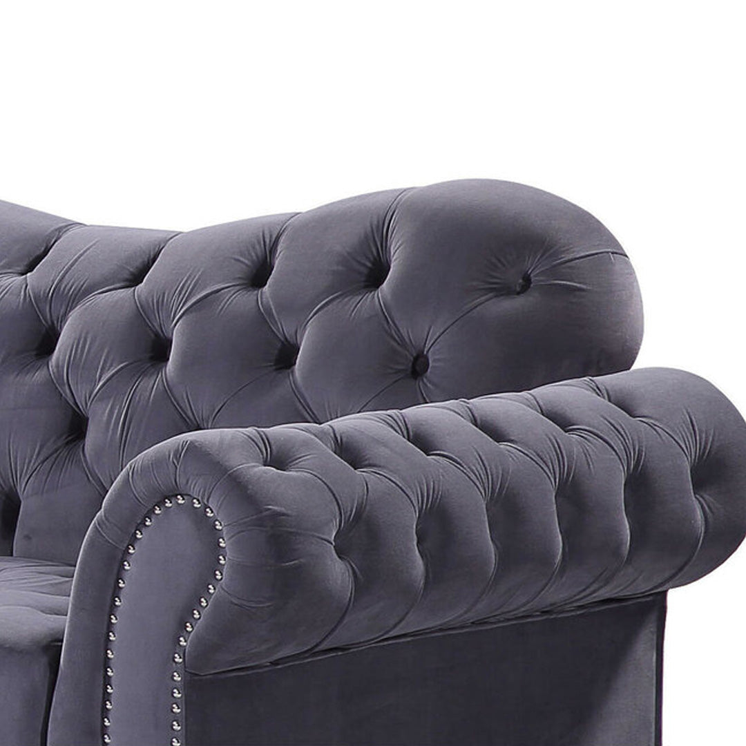 "Chic tufted fabric sofa perfect for apartments and small space interiors"