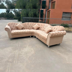 "Modern chesterfield sectional sofa in soft beige velvet for stylish homes"