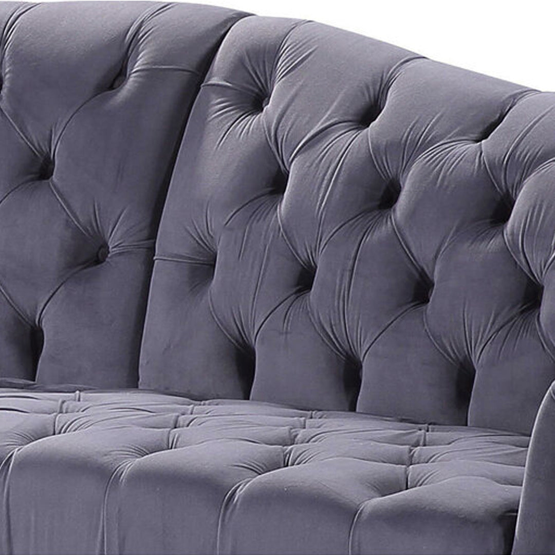 "Luxury 2 seater sofa with fabric finish, button tufting, and cushioned support"